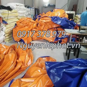 Bạt xanh cam che hàng hóa ở Bình Dương